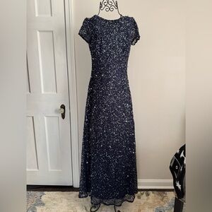 Light up the room in this Adrienna Papell Navy Sequin Evening Dress!!!